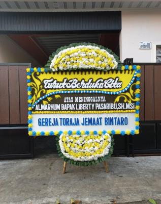 Papan Bunga Duka di Gelangan